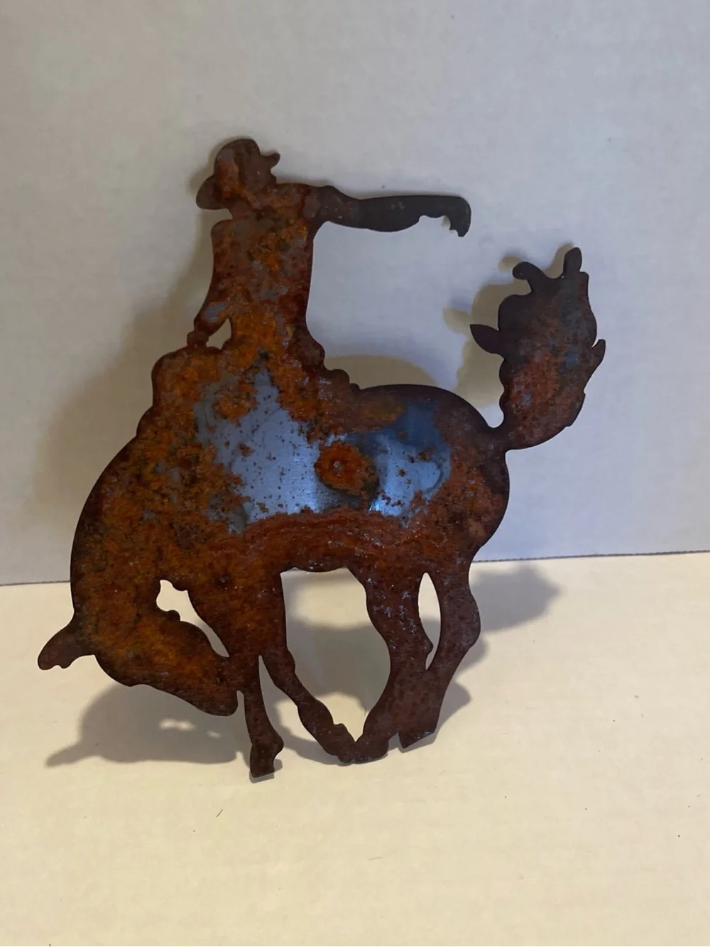 Vintage metal Rust Patina Cowboy Bucking Bronco